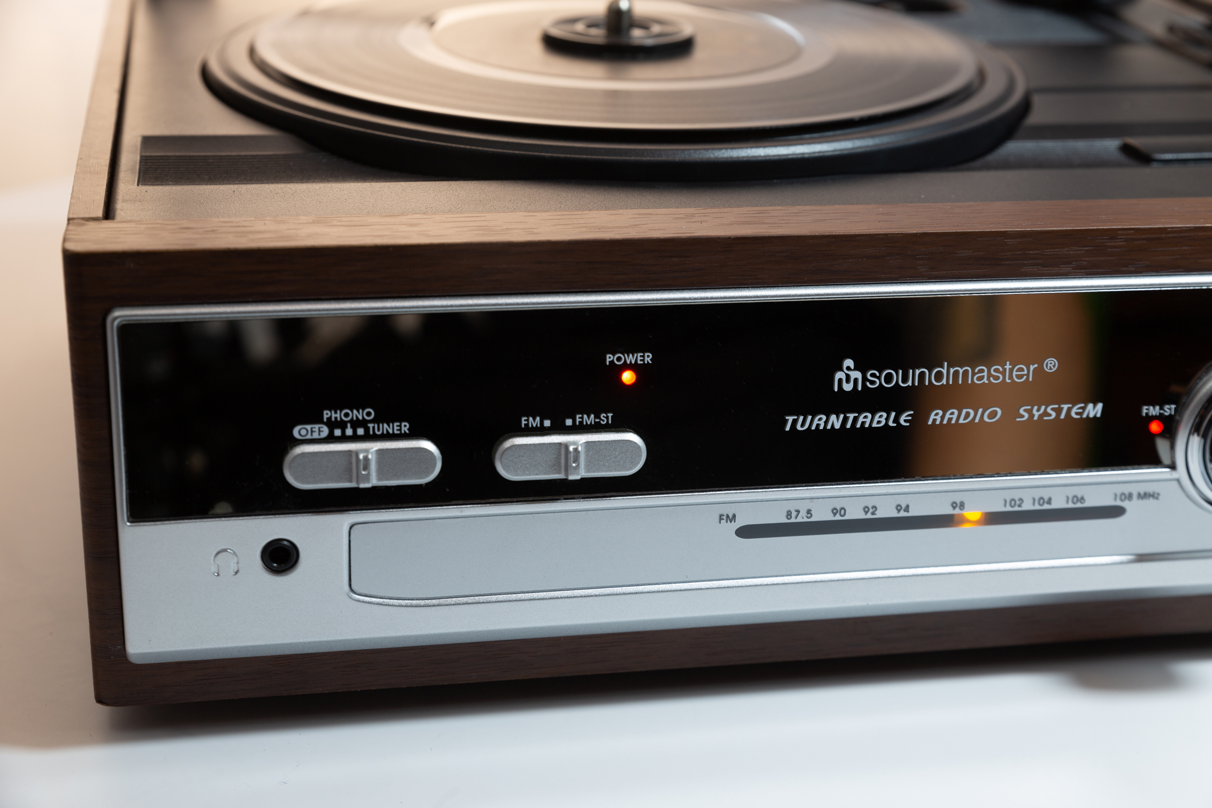 Turntable with FM stereo radio, built-in speakers