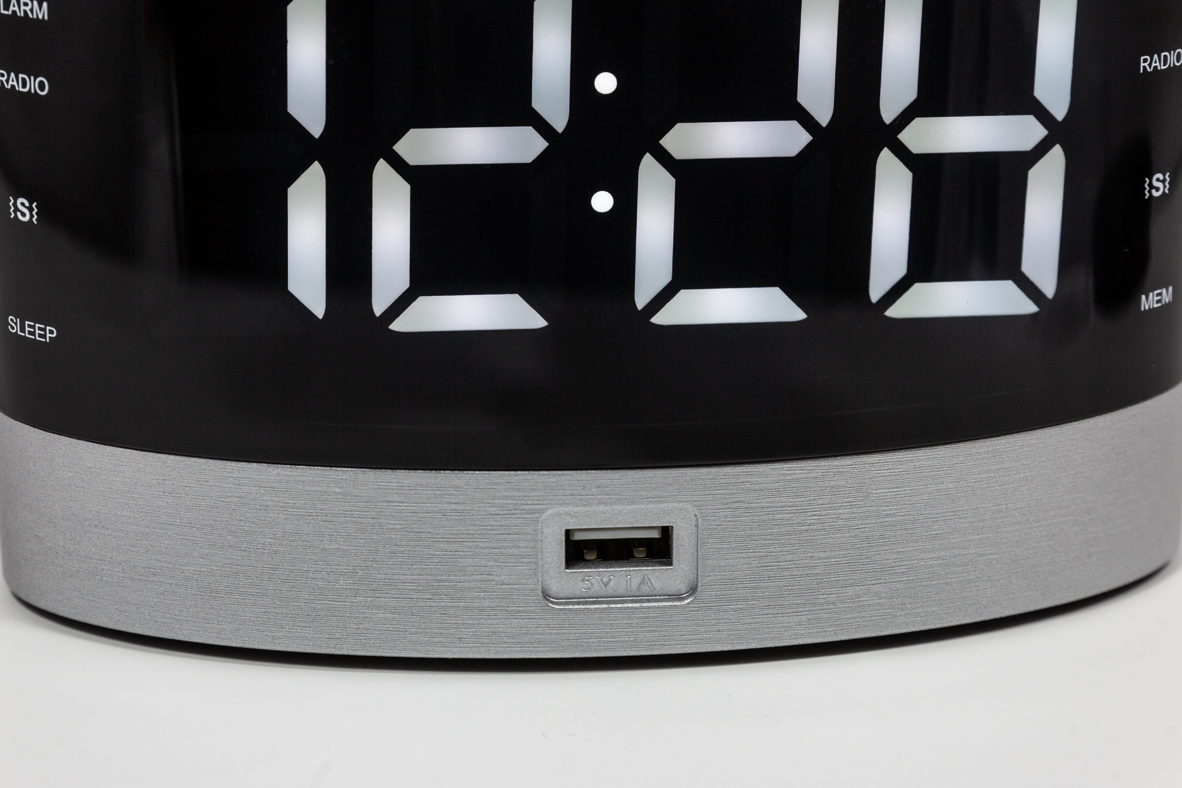 FM clock radio for aurally handicapped people with wireless wake-up vibrating pad