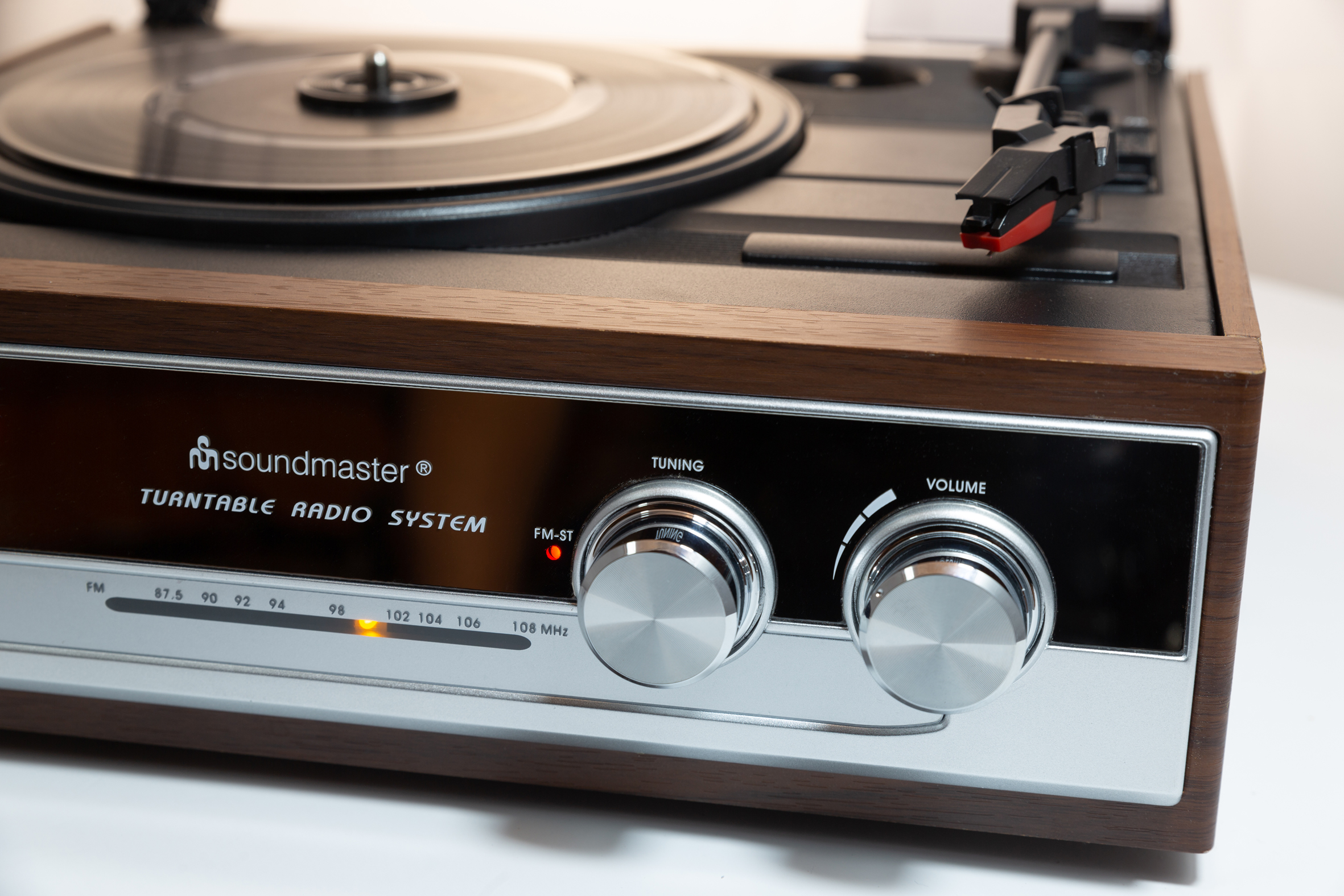 Turntable with FM stereo radio, built-in speakers